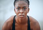 Woman, face and serious outdoor for fitness, exercise or break with exhausted, rest and wellness. Athlete, black person and thinking of workout, training or physical activity with sportswear or calm