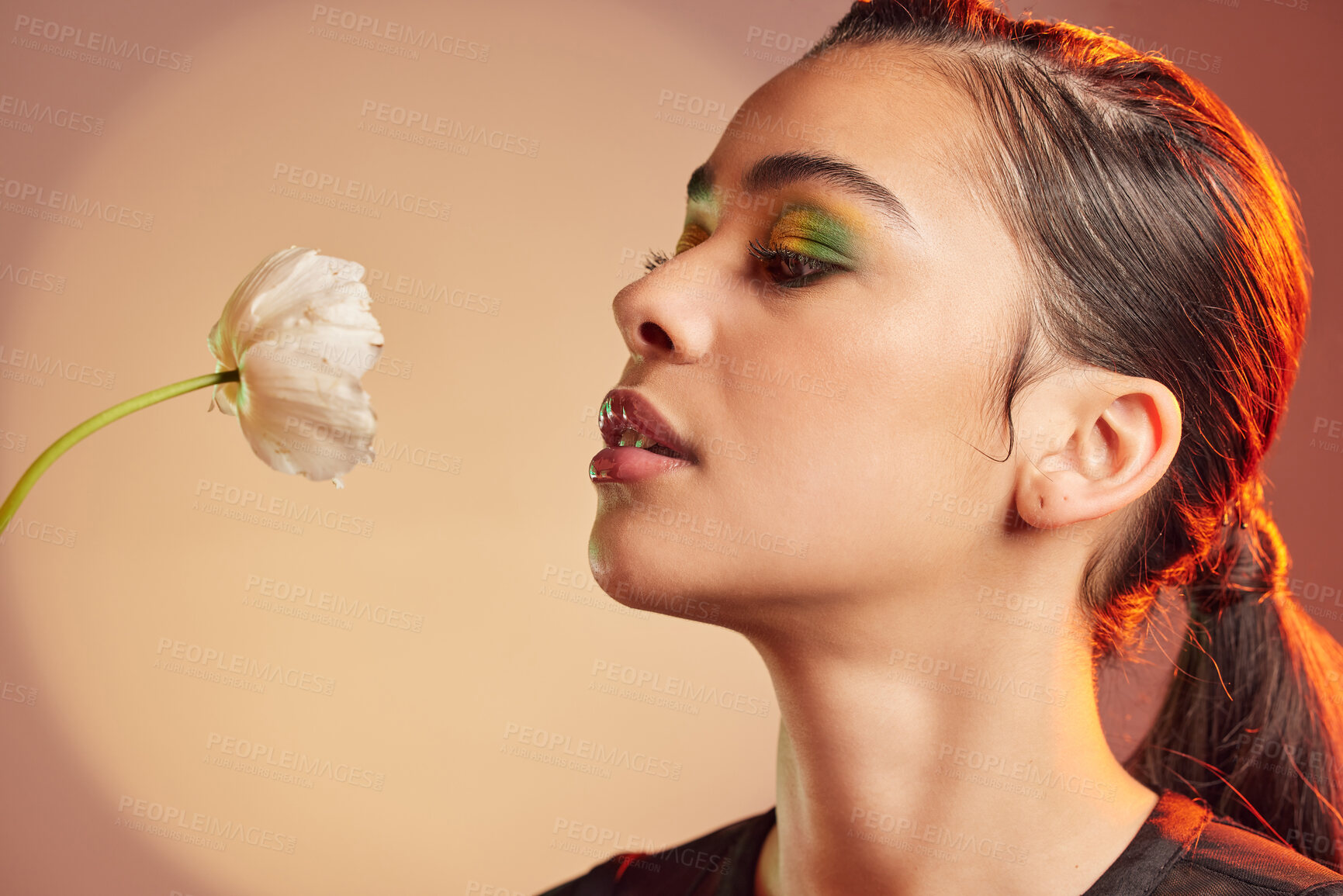 Buy stock photo Makeup, beauty and profile of woman with flower for luxury cosmetics, skincare products and fashion. Neon studio, creative art deco and face of girl with plant for self care, glamour and satisfaction