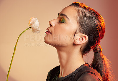 Buy stock photo Cosmetics, makeup and profile of woman with flower for luxury beauty, skincare products and fashion. Neon studio, creative cosmetics and face model with plant for self care, glamour and satisfaction