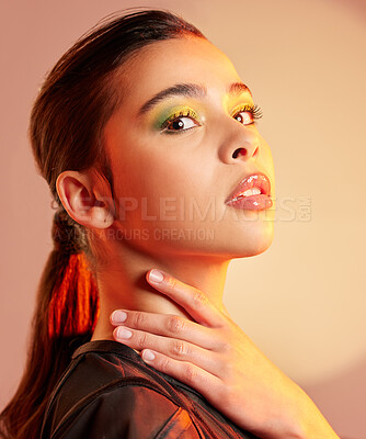 Buy stock photo Face, woman and color makeup for aesthetic, creative skincare and cool trend on studio background. Portrait, female model and glitter cosmetics on eyes for beauty, fashion glow and facial creativity