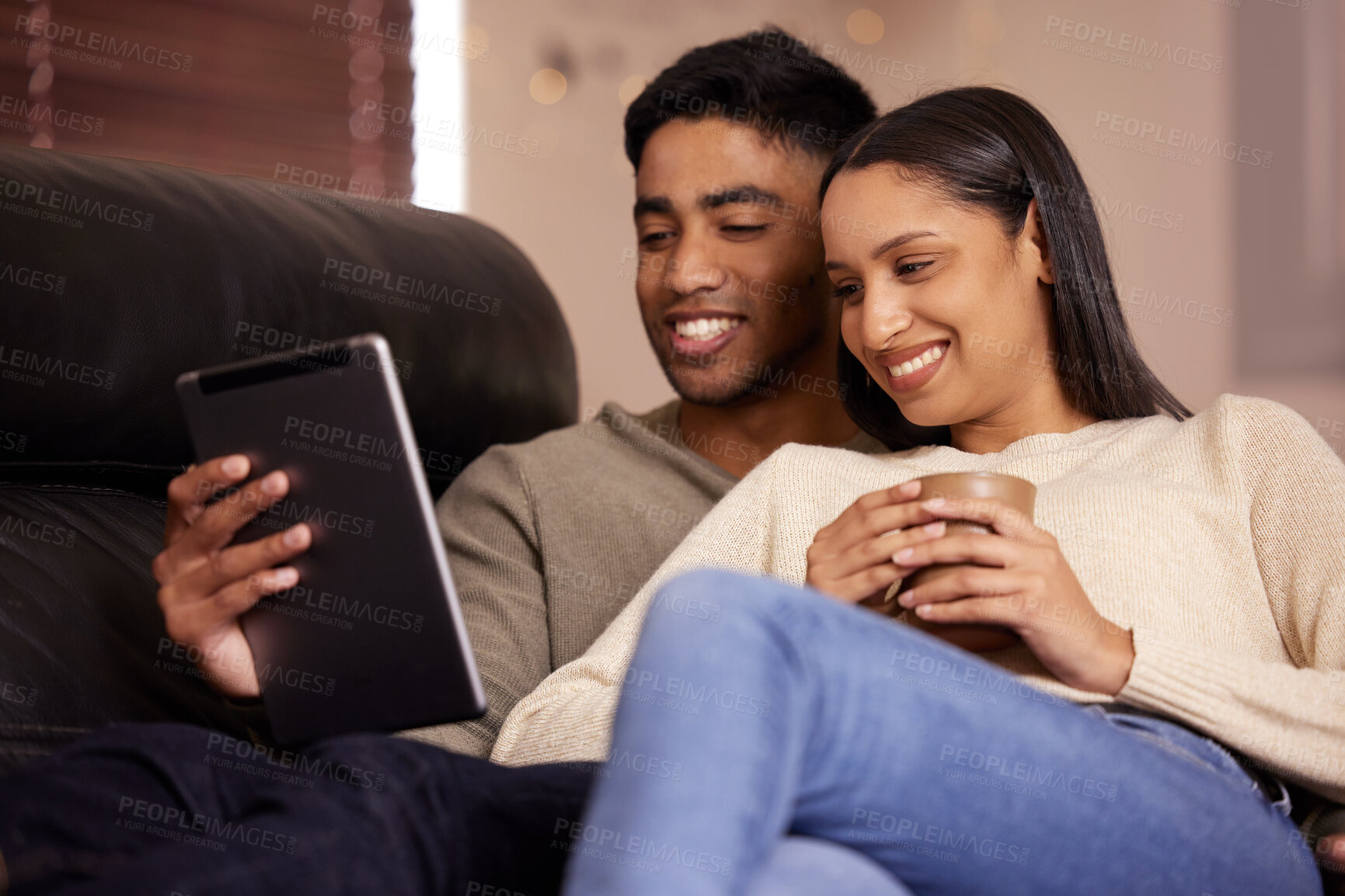 Buy stock photo Love, relax and couple with tablet on sofa for social media, movies or streaming film at home together. Happy, smile or people in living room with digital, app or video search in a house with coffee