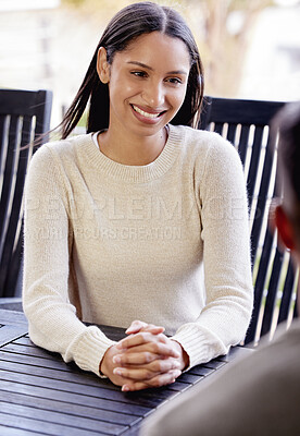 Buy stock photo Patio, outdoor and woman relax in home in conversation, discussion and talking for social chat. Happy, smile and person sitting at table with friend for bonding, relationship and communication