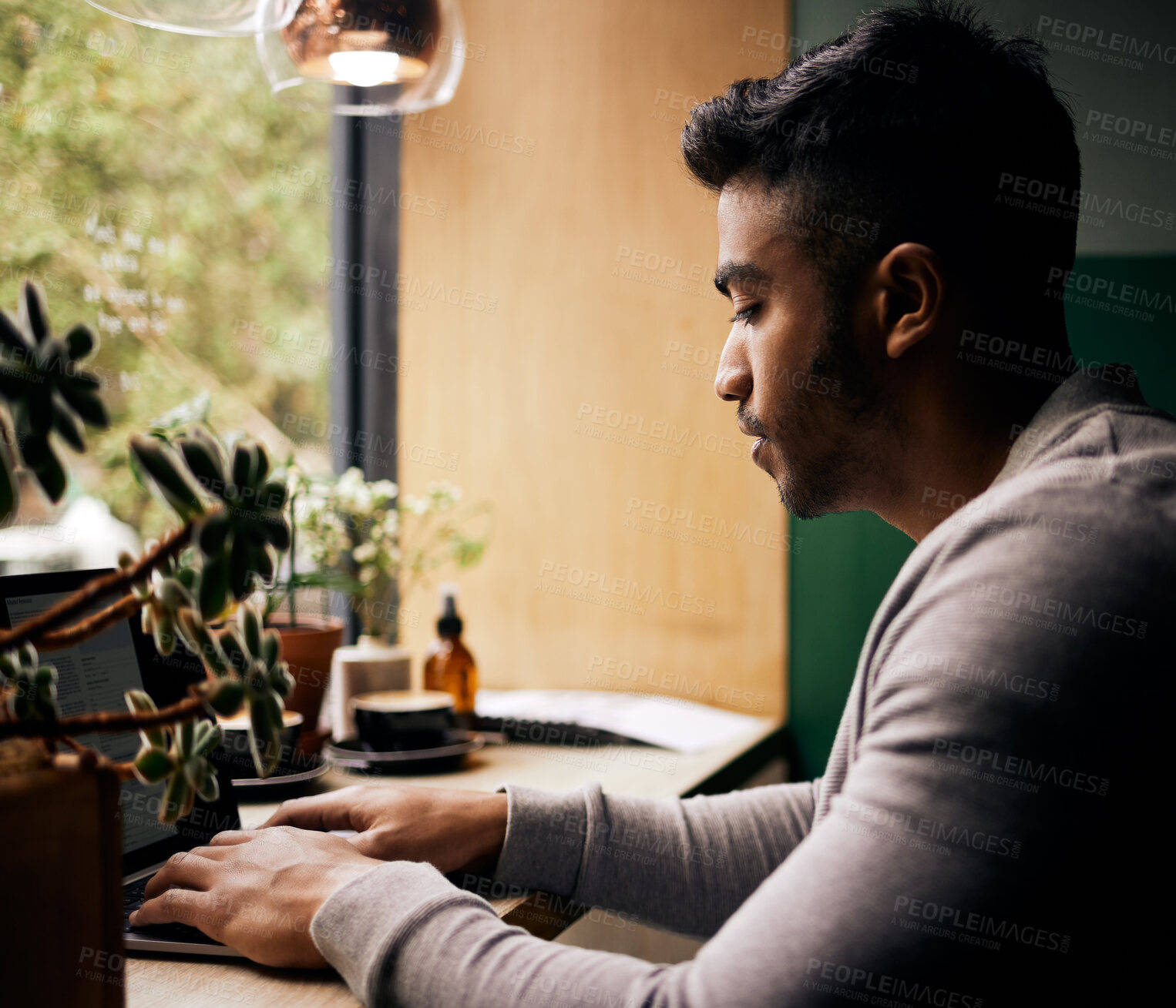 Buy stock photo Profile, man and typing on laptop in home office for remote work, research or email. Indian person, creative or freelancer for technology for communication, writing and internet by network connection