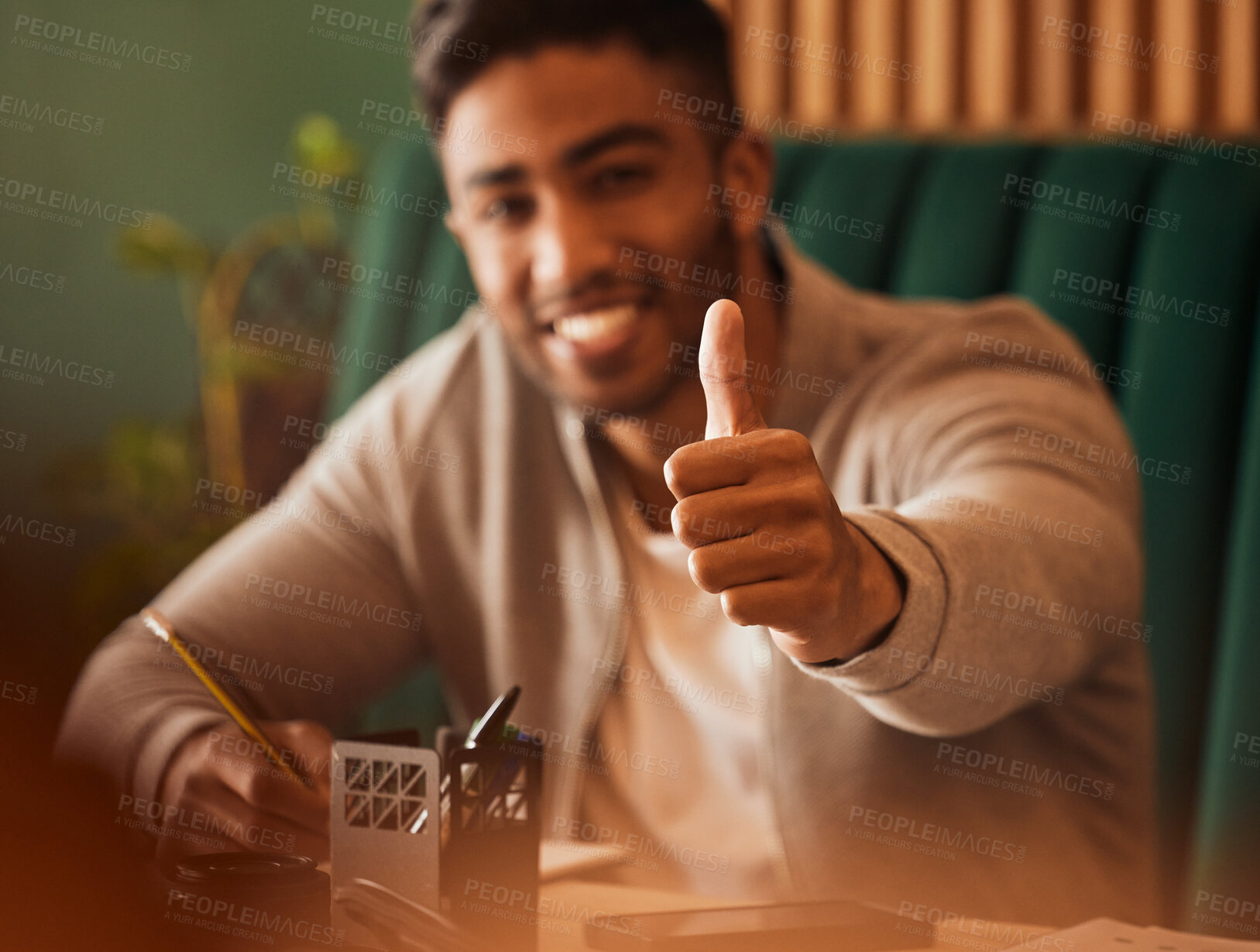 Buy stock photo Happy man, writing and thumbs up at cafe for winning, success or good job in remote work. Portrait of male person or freelancer smile with like emoji, yes sign or OK for approval at coffee shop