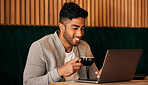 Remote work, smile and happy man with laptop at cafe for planning, search or social media. Research, blog and freelance person online at coffee shop for restaurant review, feedback or networking chat