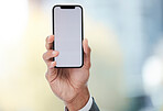 Businessman, hand and phone with mockup screen in advertising, marketing or copy space at office. Closeup of man or employee holding mobile smartphone display for advertisement, UI or UX at workplace