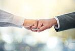 Business people, fist bump and meeting in deal, partnership or b2b for teamwork or hiring at office. Closeup of employees touching hands for agreement, greeting or introduction in job or recruiting