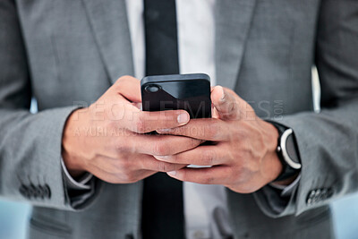 Buy stock photo Businessman, phone and hands typing for social media, communication or networking at office. Closeup of man or employee on mobile smartphone for online texting, chatting or research at workplace