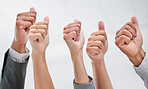 Business people, hands and thumbs up in teamwork, thank you or success together at office. Closeup of employees showing like emoji, yes sign or OK for approval, agreement or good job at workplace