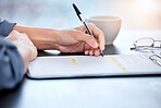 Business person, hands or writing on documents in contract, legal agreement or signing confirmation at office. Closeup of employee filling paperwork, form or application with pen on desk at workplace