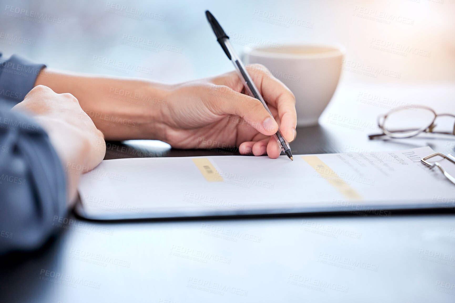 Buy stock photo Business person, hands or writing on documents in contract, legal agreement or signing confirmation at office. Closeup of employee filling paperwork, form or application with pen on desk at workplace