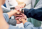 Business people, hands together and meeting in teamwork, collaboration or motivation at office. Closeup of employee group piling in team building for coordination, community or unity at workplace
