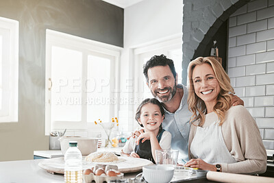 Buy stock photo Family, children and baking with a mother, girl and father in the kitchen of their home together for cooking. Food, kids and love with a woman, man and daughter learning how to bake while bonding
