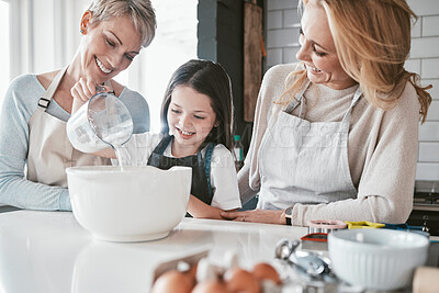 Buy stock photo Cooking, learning and family in kitchen with milk jug for food mixing preparation with smile. Happy, wellness and excited child watching mother pouring baker ingredients with grandma in home.