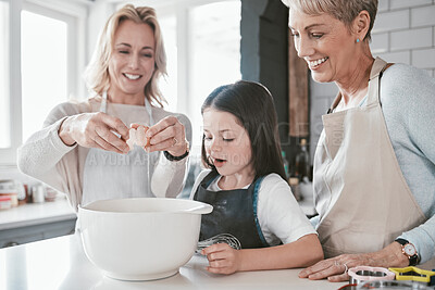 Buy stock photo Family, baking and bonding for development and learning for culinary skills in the family home. Mother, grandmother and daughter cook or cooking in house with eggs for food for hunger or snack