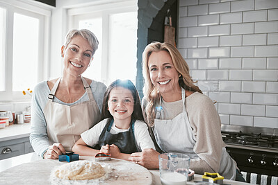 Buy stock photo Portrait mom, grandmother and kid baking together at kitchen counter, home and house for love, teaching and development. Happy family of girl child, mother and grandparent learning cookies recipe