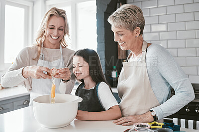 Buy stock photo Mom, grandmother and kid baking together in kitchen, family home and house of fun, learning or development. Happy family generation, girl and child crack eggs for dessert, cookies and teaching recipe