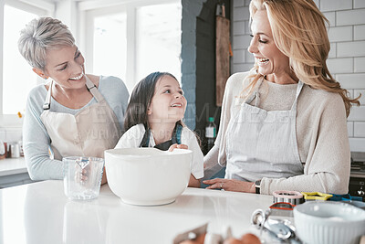Buy stock photo Child, grandmother and mom teaching cooking together in kitchen bonding, quality time or fun activity at home. Happy mother, grandma and excited kid chef learning to bake cake with family support