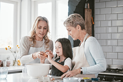Buy stock photo Baking, learning and child with mother and grandmother in the kitchen for breakfast in their house. Cooking, food and girl kid with her mom and a senior woman teaching to cook or bake as a family