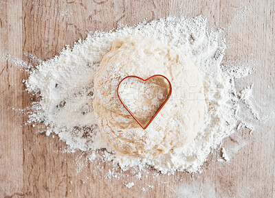 Buy stock photo Bakery flour in kitchen, wood texture table and cooking dessert with heart cookie cutter. Love pastry in wheat cake dough, recipe for baking pizza bread and love language to bake food on weekend