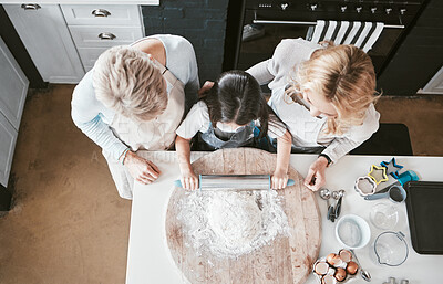 Buy stock photo Top view, baking and girl learning with family, having fun or bonding. Education, cooking and chef kid in kitchen to bake delicious food, egg and cake recipes together with mother and grandmother.