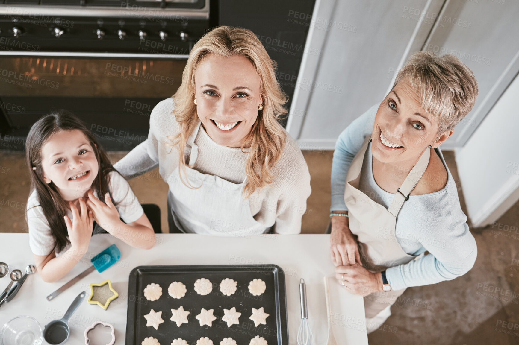 Buy stock photo Family, cooking and cookies portrait top view with happy smile together helping in home kitchen. Learning, grandma and mother with child busy with food help, preparation and baking for oven.