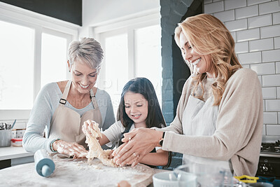 Buy stock photo Family, baking and cooking together in a home kitchen with a mother, grandmother and child learning about food, cookies or pastry. Woman and senior teaching girl chef or baker to bake a cake or pizza