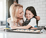 Family, children and baking with a mother and daughter learning about cooking in the kitchen of their home together. Love, kids and bake with a girl and woman teaching her child about food in a house