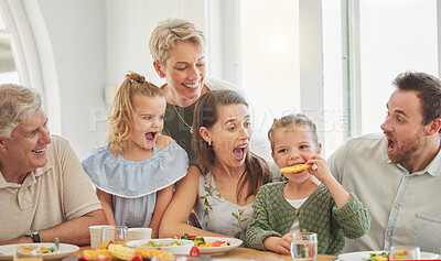 Buy stock photo Dinner, kids and happy in big family home with eating, shock and laugh with mom, dad and grandparents. Men, women and children for food, lunch or brunch with comic memory, wow or smile in dining room