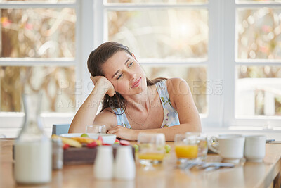 Buy stock photo Woman, thinking and breakfast at table, home and ideas with drink, food and nutrition to start morning. Girl, vision and memory with choice, decision and lunch with juice, milk or fruits in house