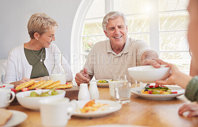 Buy stock photo Breakfast, family and hungry with senior couple, cooking
and happy together in a home. Love, support and care on a dining room with a smile and food with bonding in the morning with fruit in a house