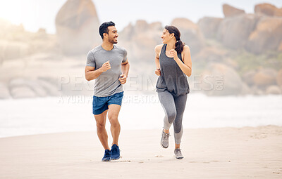 Buy stock photo Couple of friends, running and exercise by ocean in fitness training, accountability and cardio for race or support. Happy plus size woman, man or personal trainer by beach or outdoor for workout