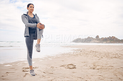 Buy stock photo Fitness, warm up and woman athlete on the beach for health and race, marathon or competition training. Sports, workout and young female runner stretching for cardio exercise by the ocean or sea.