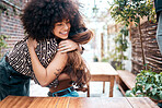 Woman, friends and hug at coffee shop outdoor for hello greeting, reunion or happy connection. Female people, embrace at restaurant table for bonding meet up for casual hangout, weekend in summer