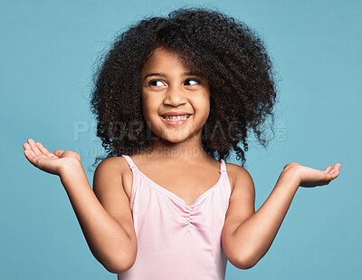 Buy stock photo Girl, hands and smile with confused, question and guess against studio background. Kid, model and confusion do sign for doubt against blue backdrop with shrug, afro and natural hair on surprise child