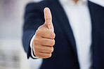 Businessman, thumbs up and closeup for thank you, support and winner vote with company growth. Hands gesture, approval and professional achievement with agreement for positive career and feedback
