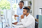 Call centre, woman and man for help on computer in office for training, software or navigation of system. Diversity, people and headset for customer care, support or helpdesk by telecommunication