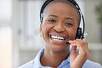 Portrait, call center and support with a business black woman closeup in an office for crm or consulting. Face, smile and headset with a happy young employee in her workplace for customer service