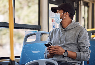 Buy stock photo Smartphone, man and mask with bus travel, connection and social media with internet, public transportation or reading notification. Person, traveller or guy with face cover, covid policy or cellphone