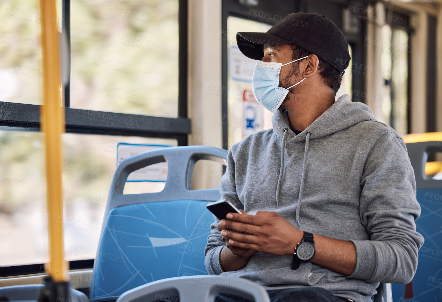 Buy stock photo Smartphone, man and mask with bus travel, connection and social media with internet, public transportation or reading notification. Person, traveller or guy with face cover, covid policy or cellphone