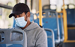 Man in bus with mask, checking phone and morning travel to city, reading service schedule or social media. Public transport safety in covid, urban commute and person in sitting with smartphone app.