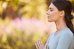 Calm, meditation and woman doing yoga in park for peace, quiet and zen. Healthy lifestyle, relax and hands of girl together to mediate in nature. Motivation, wellness and mindful exercise in morning