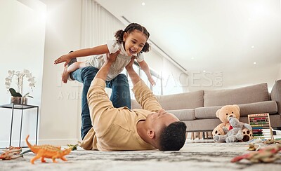 Buy stock photo Happy family, father and girl playing in a house with freedom, bonding and enjoying quality time together. Happiness, smile and child flying in dads arms on the floor on a weekend at home in Portugal