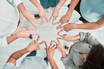 Buy stock photo Business people, hands and peace in support above for trust, unity or teamwork for company goals at the office. Hand of group in corporate solidarity, partnership and star symbol with fingers at work