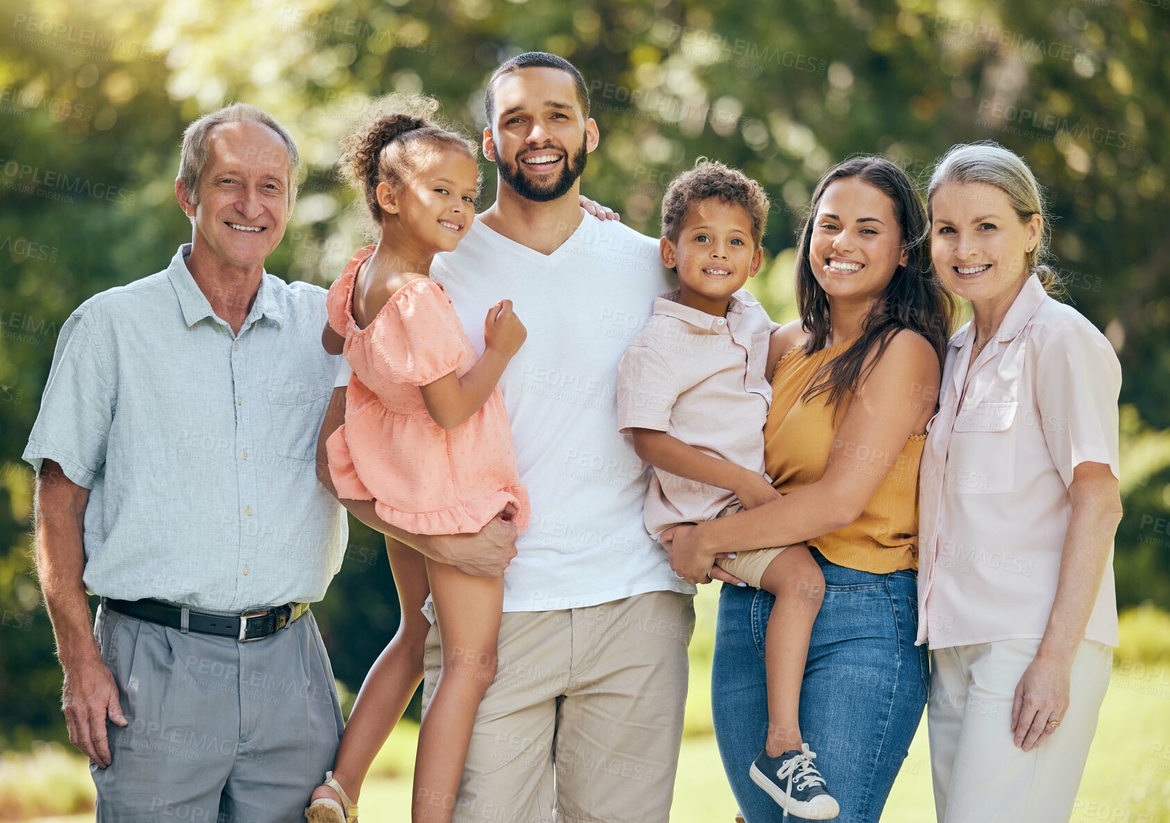 Buy stock photo Portrait, family and park with kids, parents and grandparents bonding in summer, relax and happy in nature. Smile, love and children having fun with interracial, happy family and cheerful in a garden
