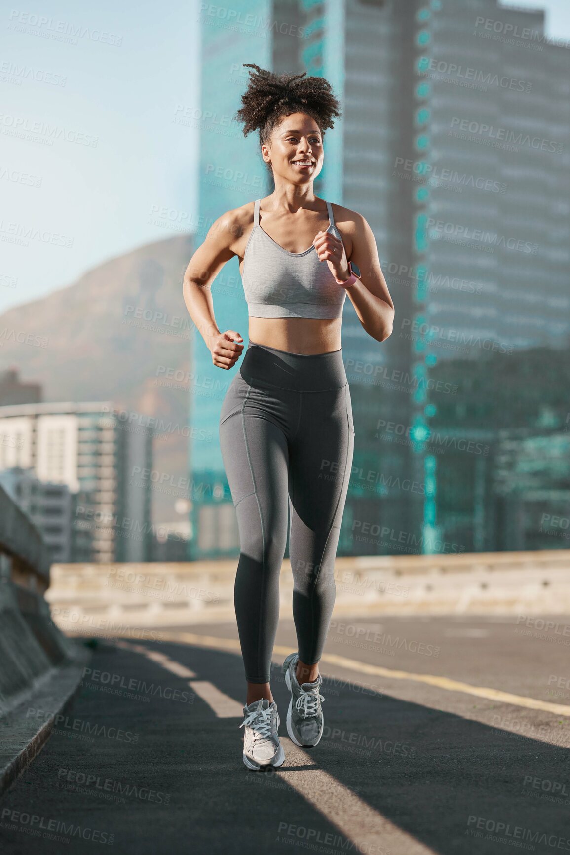 Buy stock photo Running, fitness and city with a sports woman on a street for a cardio or endurance workout alone in the day. Health, training and exercise with a female athlete or runner on an asphalt road in town