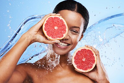 Buy stock photo Fruit, skincare and black woman smile with grapefruit for facial wellness and skin glow. Portrait of a woman model with water splash and vitamin c for beauty, cosmetic nutrition and natural detox