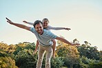 Family, love and airplane game with girl and father in a forest for playing, fun and bonding in nature, happy and smile. Happy family, man and child enjoy fantasy game, freedom and laughing in park