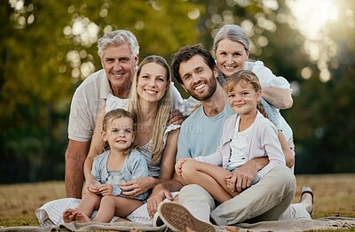 Buy stock photo Family picnic, park portrait and smile with kids, parents or grandparents for bonding together, love or relax. Happy family, nature and generation care with children, mom and dad in summer sunshine