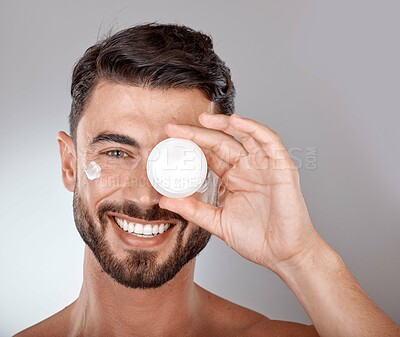 Buy stock photo Beauty, skincare and portrait of man with cream on gray background for wellness, spa treatment and hygiene. Cosmetics, grooming and face of male model with lotion, self care and facial treatment